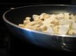 tofu cooking in a pan
