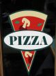 pizza sign in a window