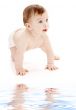 crawling baby boy looking up