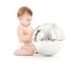 adorable baby boy with big disco ball