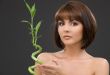 brunette with bamboo over grey