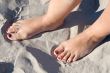 feet in the sand