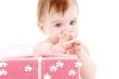 baby boy with puzzle gift box