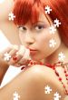 puzzle of redhead with red beads