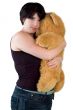 young woman cuddling with teddybear
