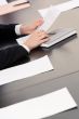 Hands with document