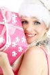 santa helper girl with pink puzzle gift box