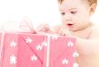 baby boy with puzzle gift box