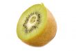 cutting kiwi on white