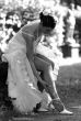 Beautiful bride adjusting her stockings