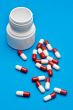 Pills over blue background