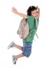 happy child jumping with backpack