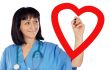 medical cardiologist drawing a heart