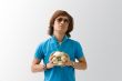 Sporty Asian guy with ball