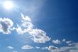 day blue sky with white fluffy clouds