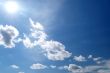 day blue sky with white fluffy clouds