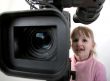 girl look in the camcorder