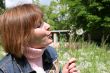 woman and dandelion