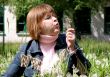 woman and dandelion