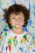 Boy playing with painting