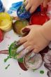 Child hands in paints