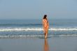 Beautiful girl on the ocean beach