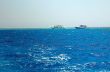 Two ships in the sea.