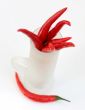 red peppers in a frosted glass isolated