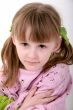 little girl in pink poncho