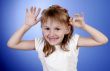 little girl make faces