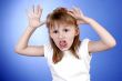 little girl make faces