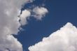 Puffy Clouds on a blue sky.
