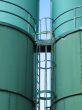 giant green containers, silos