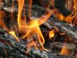 Wood burning on fire.