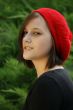 Portrait of a young girl with red cap.