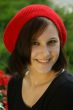 Portrait of a young girl with red cap.