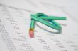 Green rubber pencil twisted into a knot