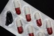 Pills in plastic container