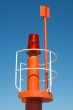 photo of small lighthouse on the daytime