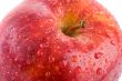 Macro apple with red drops of water - Shallow DOF