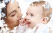 smiling baby in mother hands