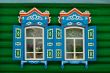 Two open windows of Russian village house