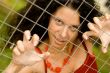 woman behind a lattice