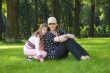 Mother and daughter on lawn