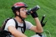 Cycling man drinking water