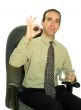 Businessman Sitting With Coffee
