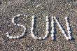 word sun made of white stones