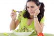 Girl eating salad. I do not like anything