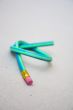 Green rubber pencil twisted into a knot