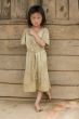Girl of Laos in dirty clothes